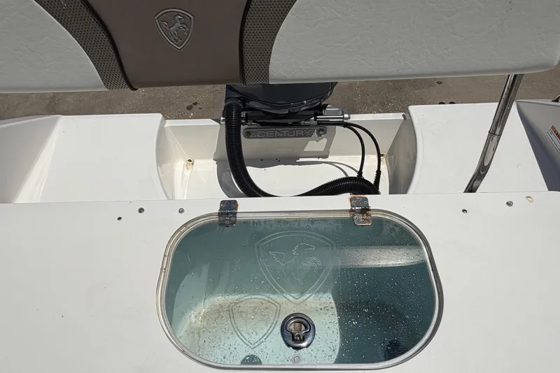 Slide: The Image of 2016 Century 2301 Center Console boat with livewell and engine compartment. - 70