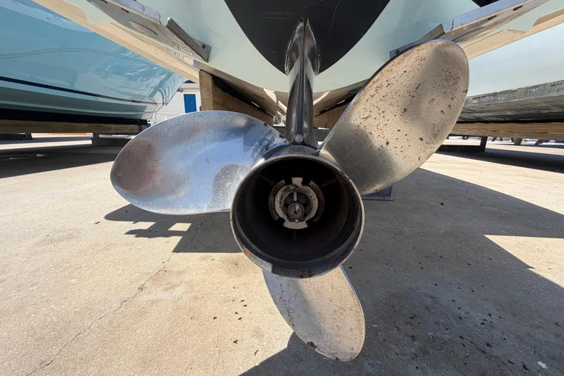 Slide: The Image of Propeller of a 2016 Century 2301 Center Console boat on dry dock. - 9