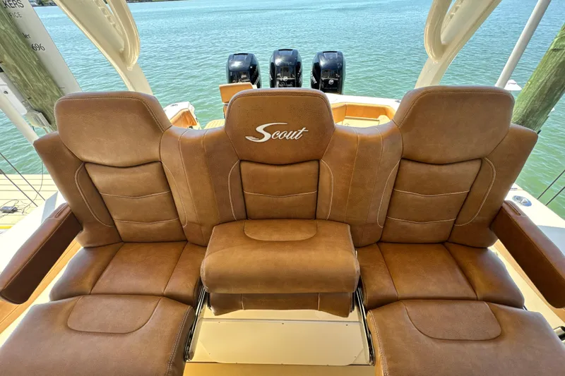 Slide: The Image of Luxurious leather seating on a 2018 Scout 355 LXF boat with triple engines. - 21