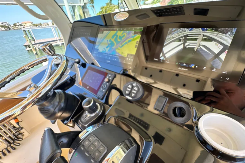Slide: The Image of Helm of 2018 Scout 355 LXF with advanced navigation and control systems. - 24