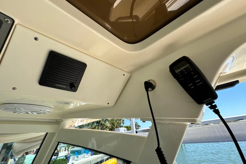 Slide: The Image of Interior view of a 2018 Scout 355 LXF boat with Garmin electronics. - 51