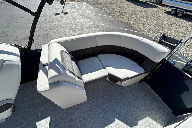 Slide: The Image of 2026 Harris Cruiser 230 CWDH boat interior with plush seating and modern design. - 18