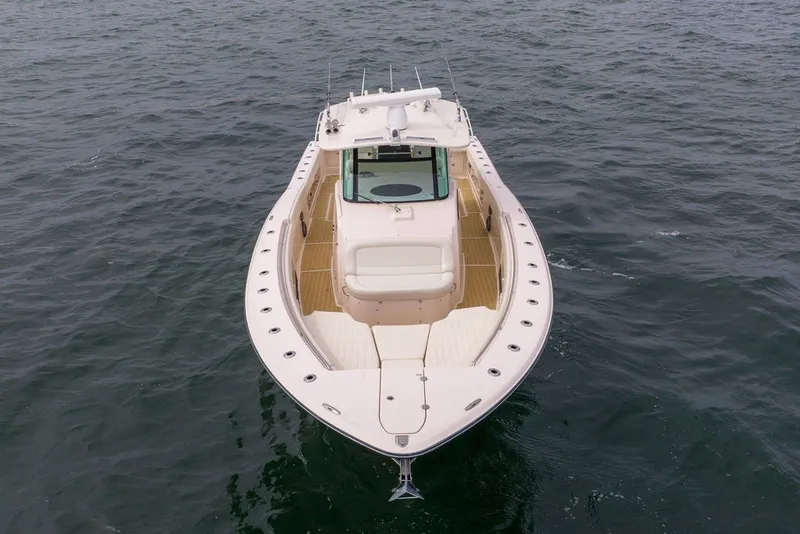 Slide: The Image of 2014 Grady-White Canyon 376 boat on open water, aerial view. - 4