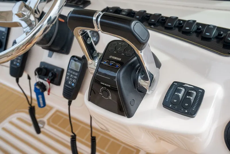 Slide: The Image of Control panel of a 2014 Grady-White Canyon 376 boat with Yamaha throttle. - 41