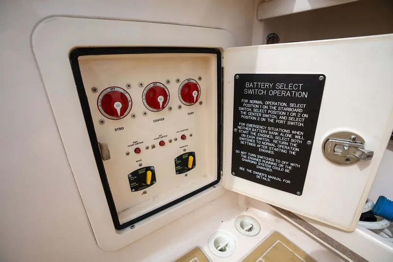 Slide: The Image of Battery select switch panel on 2014 Grady-White Canyon 376 boat. - 48