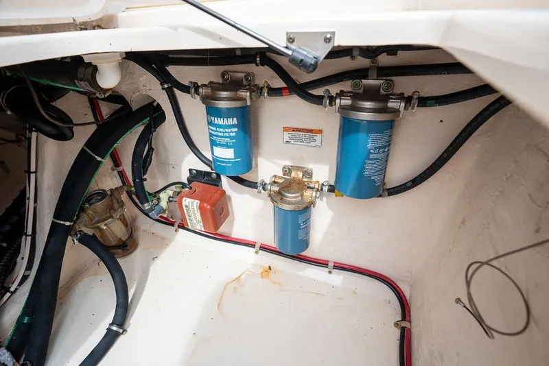 Slide: The Image of Engine compartment of 2014 Grady-White Canyon 376 with Yamaha fuel filters and wiring. - 50