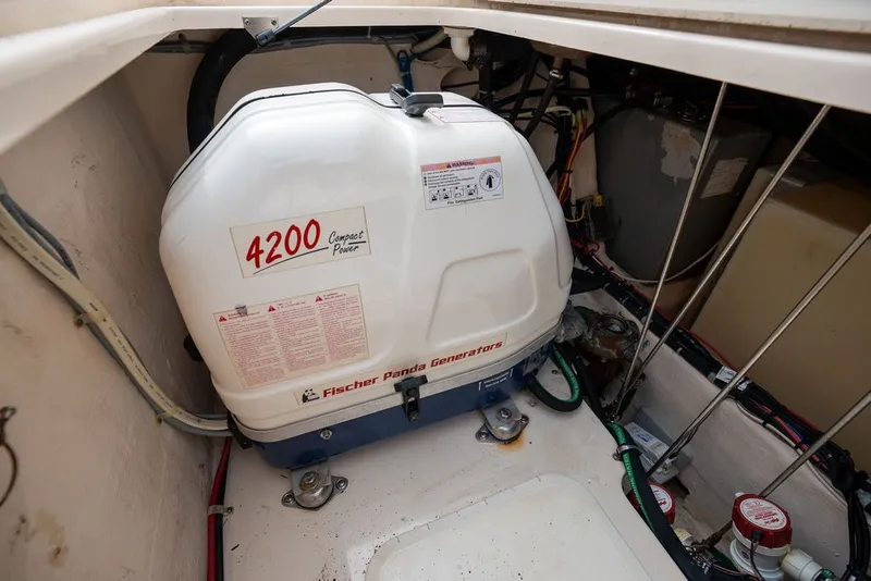 Slide: The Image of Fischer Panda generator in 2014 Grady-White Canyon 376 boat engine compartment. - 52