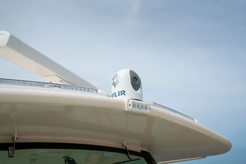 Slide: The Image of 2014 Grady-White Canyon 376 boat with FLIR camera on roof. - 54
