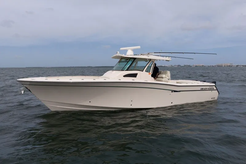 Slide: The Image of 2014 Grady-White Canyon 376 boat on open water, side view. - 2
