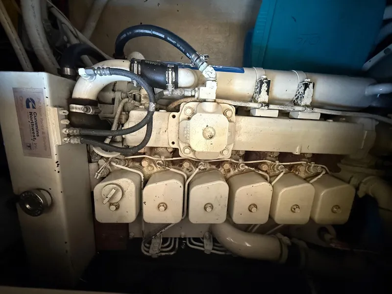 Slide: The Image of Engine compartment of a 1998 Nordic Tug Trawler with Cummins components. - 7