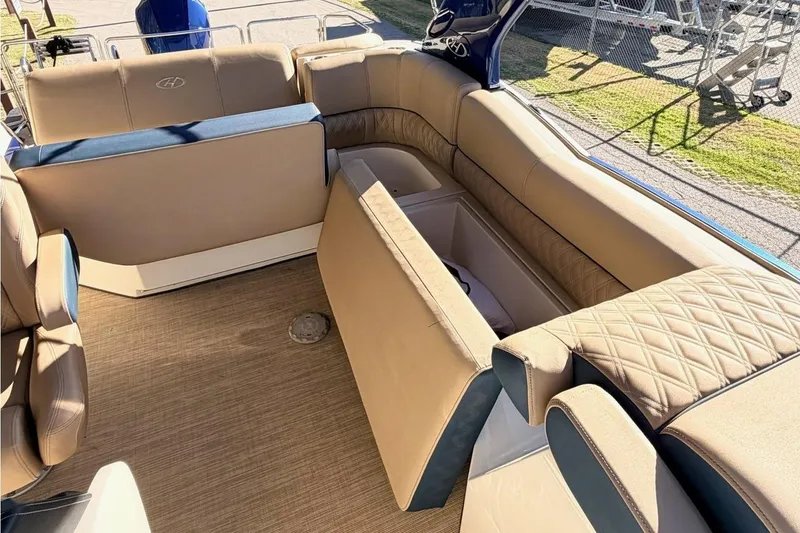 Slide: The Image of 2021 Harris Crowne SL 250 boat interior with luxurious seating and canopy. - 13