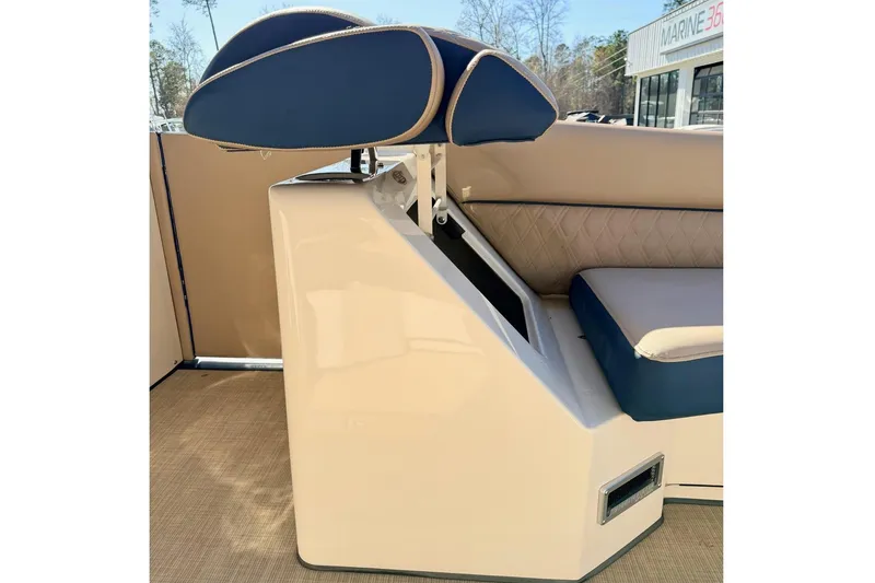 Slide: The Image of 2021 Harris Crowne SL 250 boat interior with blue and beige seating. - 7
