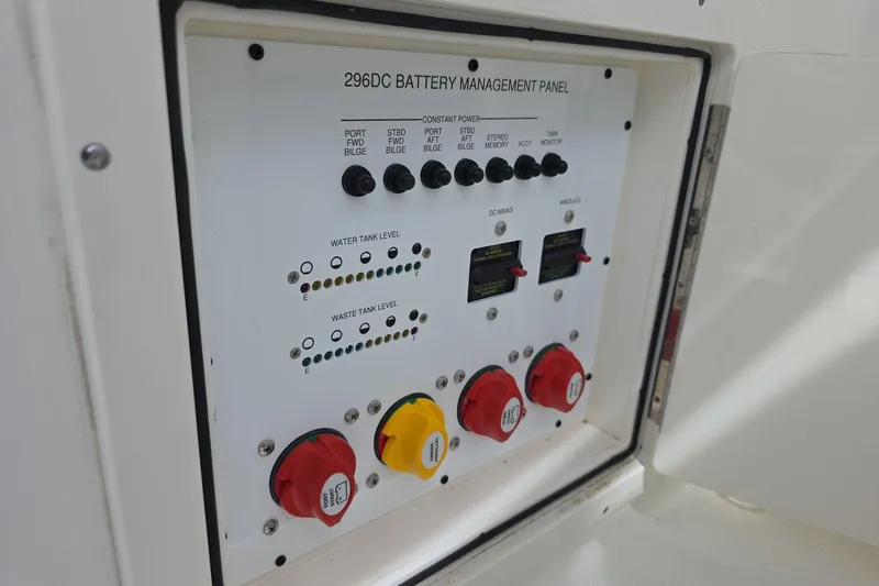 Slide: The Image of Battery management panel on 2021 World Cat 296 DC boat, showing controls and indicators. - 18