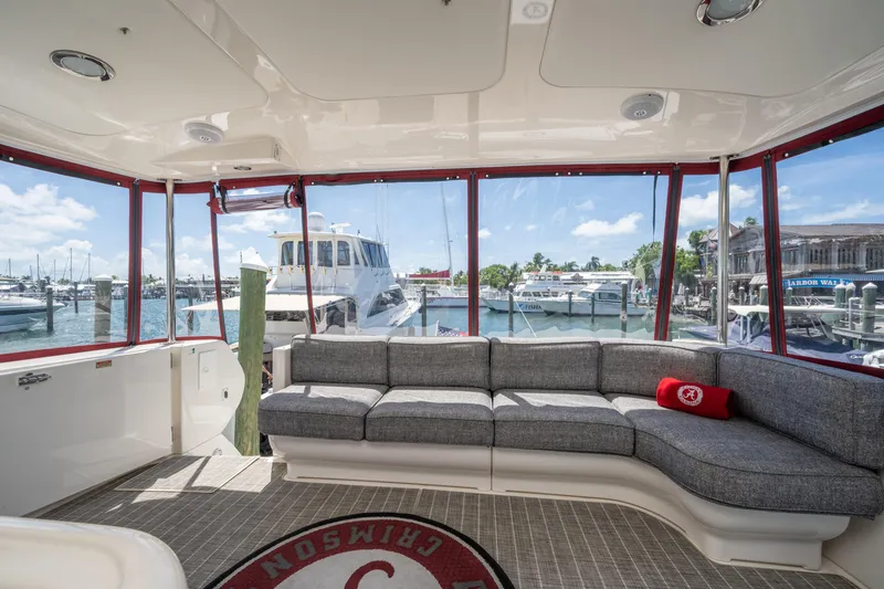 Slide: The Image of Luxurious interior of 2003 Sea Ray 480 Motor Yacht with marina view. - 18