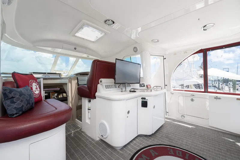 Slide: The Image of Interior of 2003 Sea Ray 480 Motor Yacht with plush seating and modern amenities. - 21