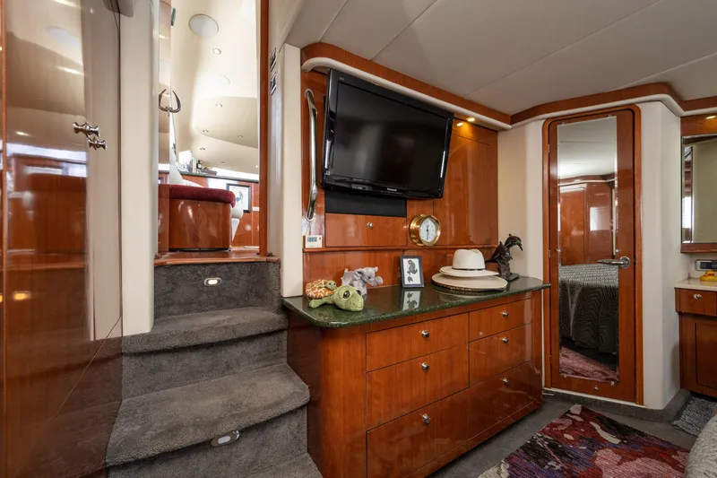 Slide: The Image of Luxurious interior of 2003 Sea Ray 480 Motor Yacht with elegant wood cabinetry and modern amenities. - 28