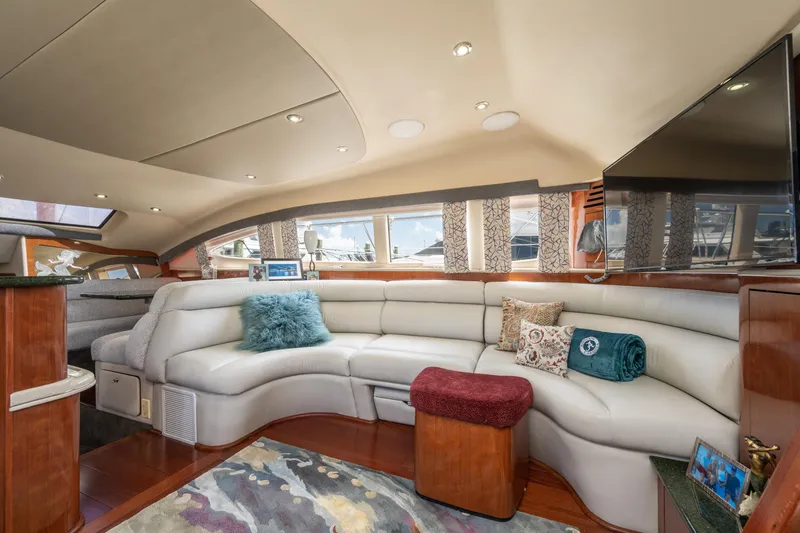 Slide: The Image of Luxurious interior of 2003 Sea Ray 480 Motor Yacht with plush seating and elegant decor. - 29