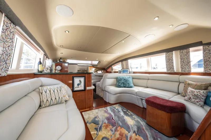 Slide: The Image of Luxurious interior of 2003 Sea Ray 480 Motor Yacht with plush seating and elegant decor. - 30