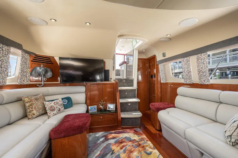 Slide: The Image of Luxurious 2003 Sea Ray 480 Motor Yacht interior with plush seating and modern decor. - 32