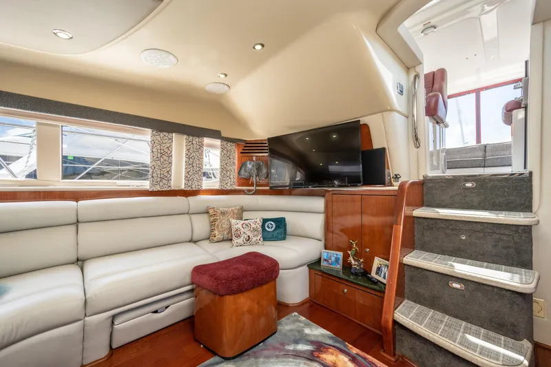 Slide: The Image of Luxurious interior of 2003 Sea Ray 480 Motor Yacht with plush seating and elegant decor. - 33