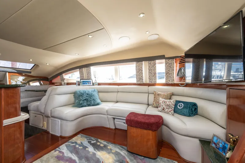 Slide: The Image of Luxurious interior of 2003 Sea Ray 480 Motor Yacht with plush seating and modern decor. - 34
