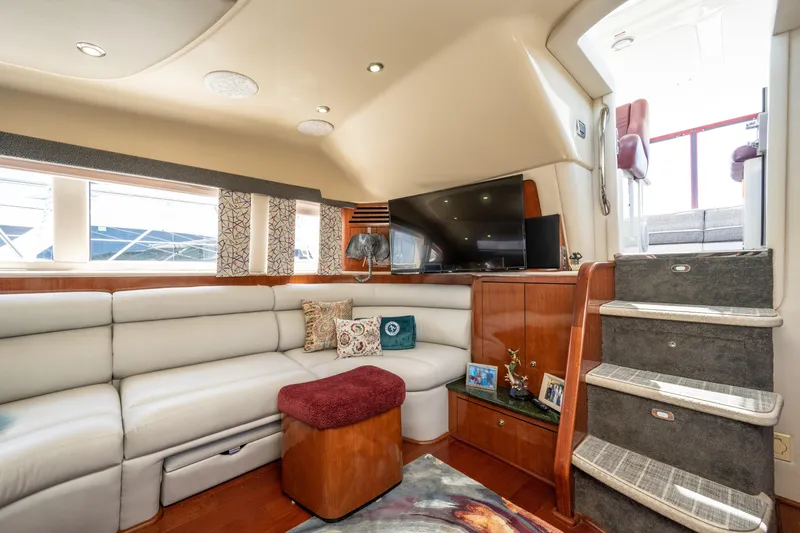 Slide: The Image of Luxurious interior of 2003 Sea Ray 480 Motor Yacht with plush seating and elegant decor. - 35