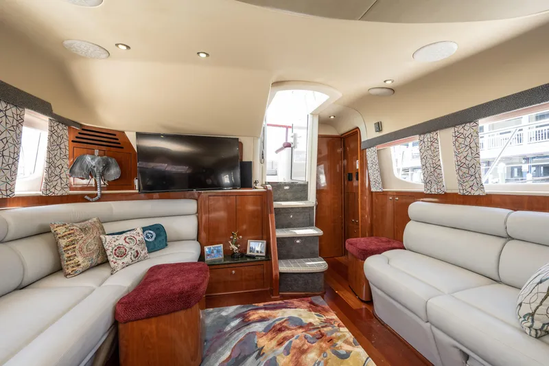 Slide: The Image of Luxurious 2003 Sea Ray 480 Motor Yacht interior with plush seating and modern decor. - 45