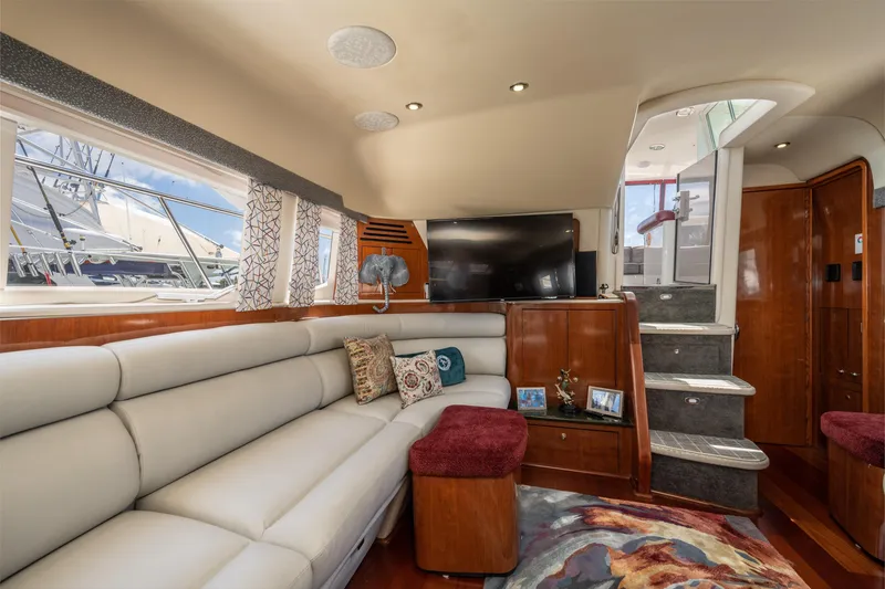 Slide: The Image of Luxurious interior of 2003 Sea Ray 480 Motor Yacht with plush seating and modern decor. - 47