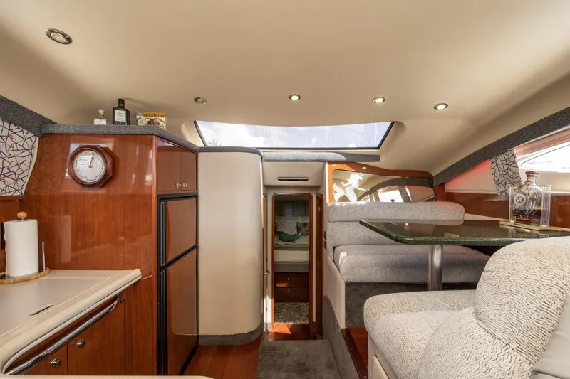 Slide: The Image of Luxurious interior of 2003 Sea Ray 480 Motor Yacht with elegant seating and modern amenities. - 48
