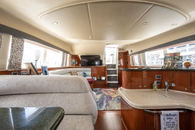 Slide: The Image of Luxurious interior of 2003 Sea Ray 480 Motor Yacht with elegant furnishings. - 53