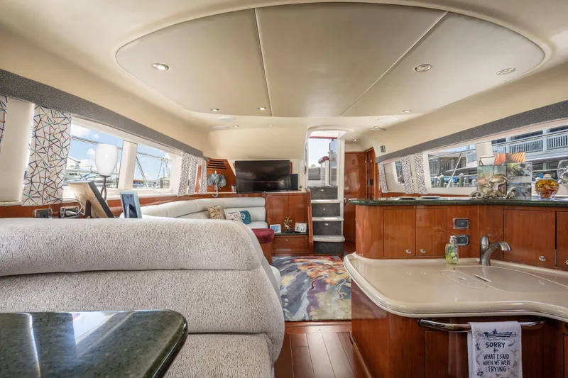 Slide: The Image of Luxurious interior of a 2003 Sea Ray 480 Motor Yacht with elegant furnishings. - 55