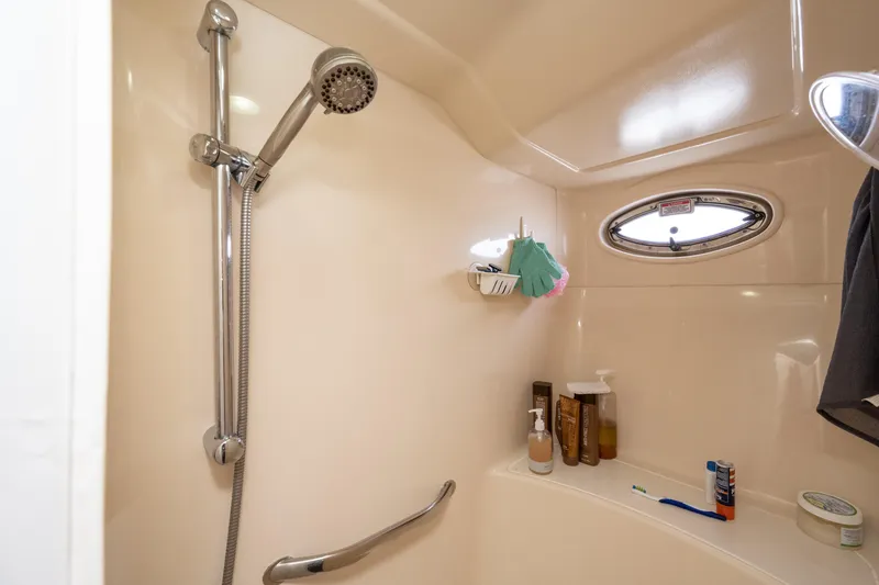 Slide: The Image of Shower area in 2003 Sea Ray 480 Motor Yacht with toiletries and window. - 60