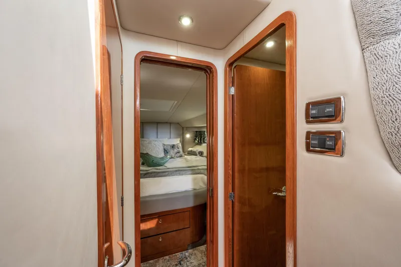 Slide: The Image of Interior cabin view of 2003 Sea Ray 480 Motor Yacht with cozy bedroom. - 61