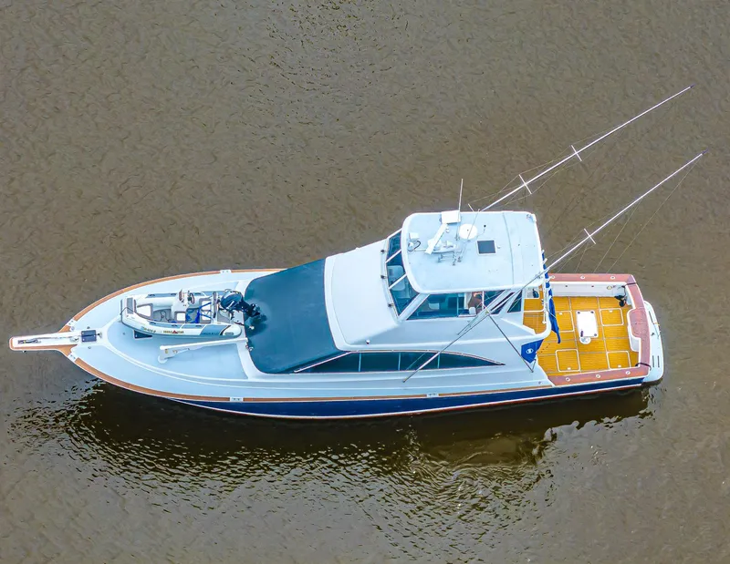 Slide: The Image of Aerial view of 1997 Ocean Yachts 60 Super Sport EB on calm water. - 30