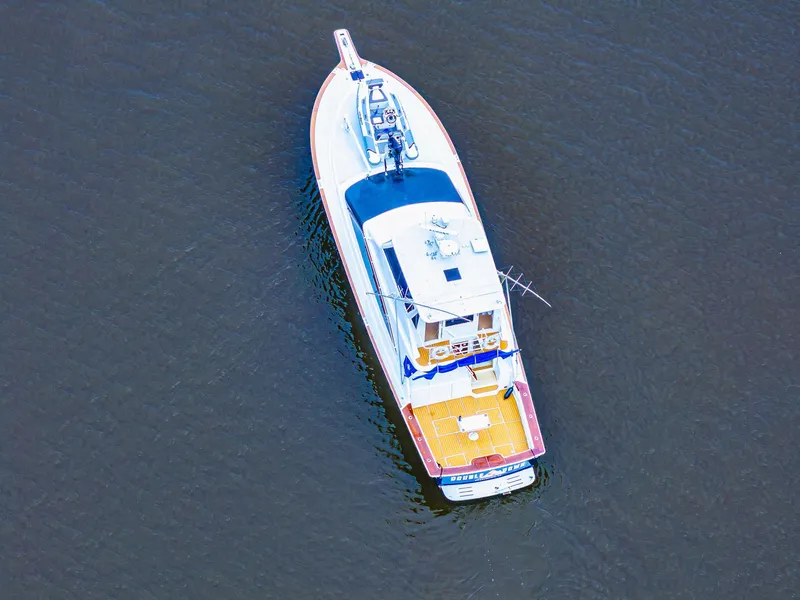 Slide: The Image of Aerial view of 1997 Ocean Yachts 60 Super Sport EB on calm water. - 32