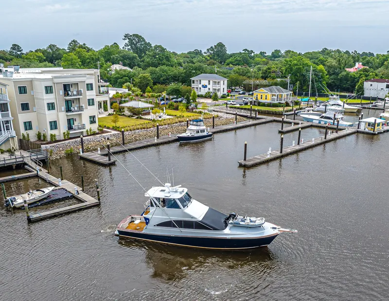 Slide: The Image of Aerial view of 1997 Ocean Yachts 60 Super Sport EB in a marina setting. - 34