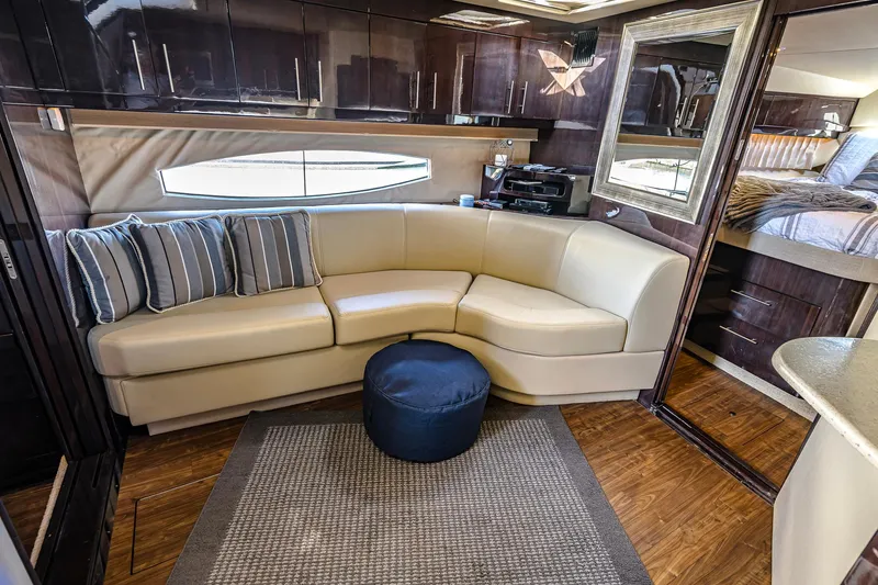 Slide: The Image of Interior of 2016 Regal 46 Sport Coupe with leather seating and modern decor. - 24