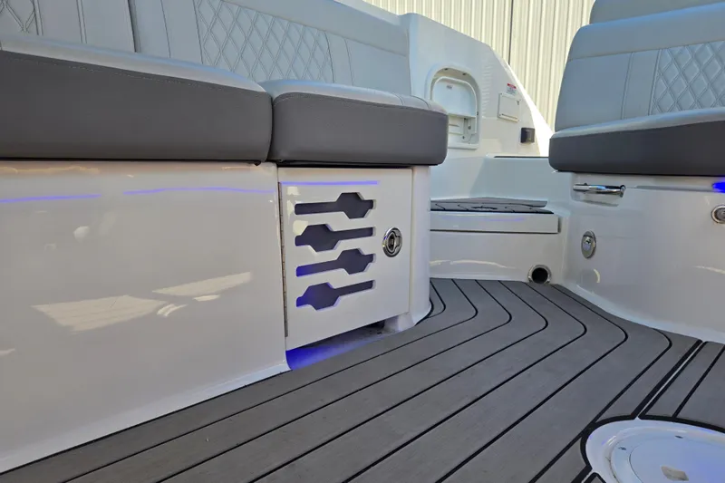 Slide: The Image of Interior seating and flooring of 2022 Sea Ray SLX 280 boat, featuring modern design elements. - 27