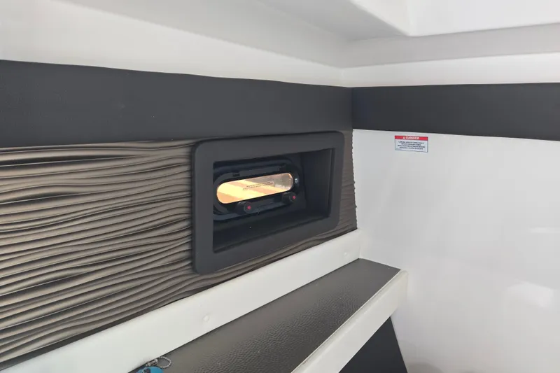 Slide: The Image of Interior view of 2022 Sea Ray SLX 280 boat cabin with window detail. - 37