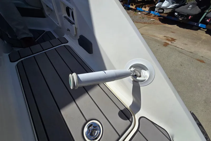Slide: The Image of 2022 Sea Ray SLX 280 boat deck with retractable cleat detail. - 52