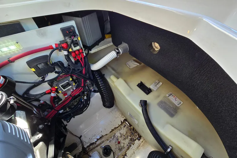 Slide: The Image of Engine compartment of 2022 Sea Ray SLX 280 boat, showcasing wiring and components. - 55