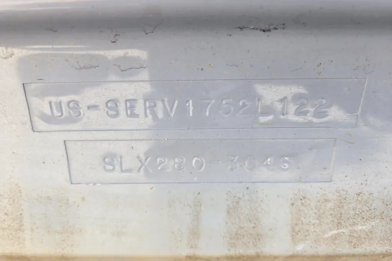Slide: The Image of 2022 Sea Ray SLX 280 hull identification number embossed on the boat's surface. - 64
