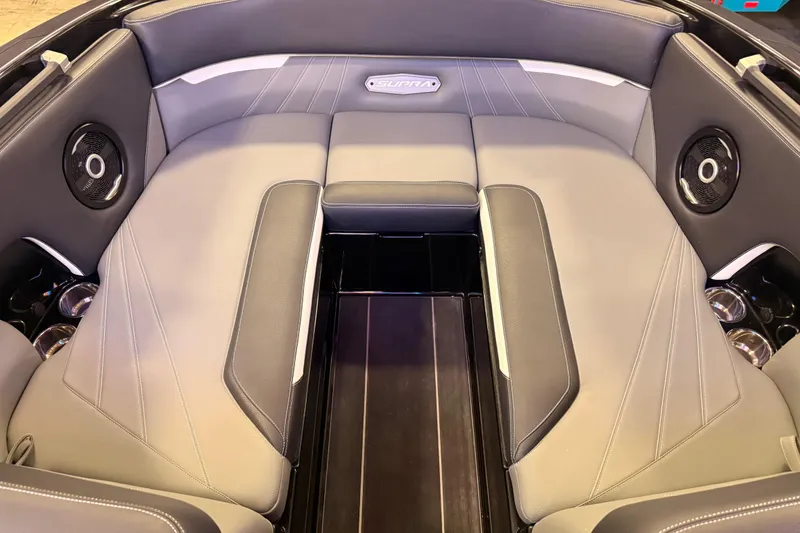 Slide: The Image of 2024 Supra SA boat interior with luxurious seating and integrated speakers. - 4