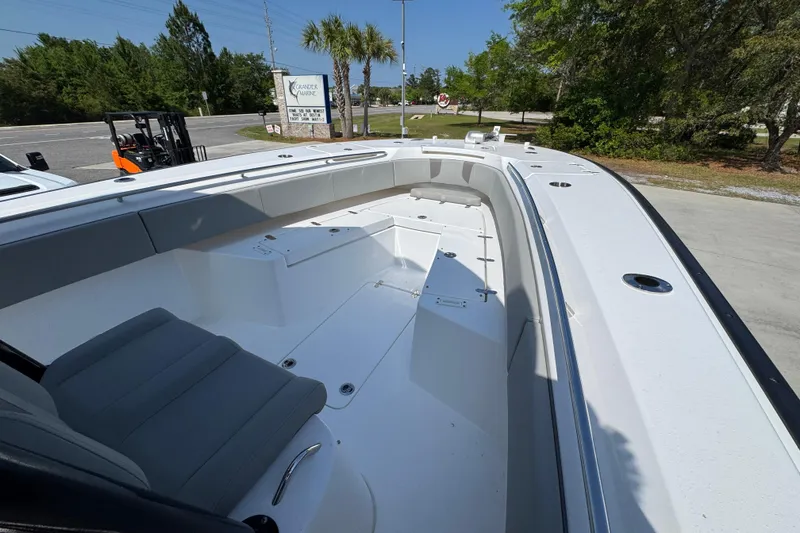 Slide: The Image of 2025 Cape Horn 32 XS boat interior with seating and storage compartments. - 17
