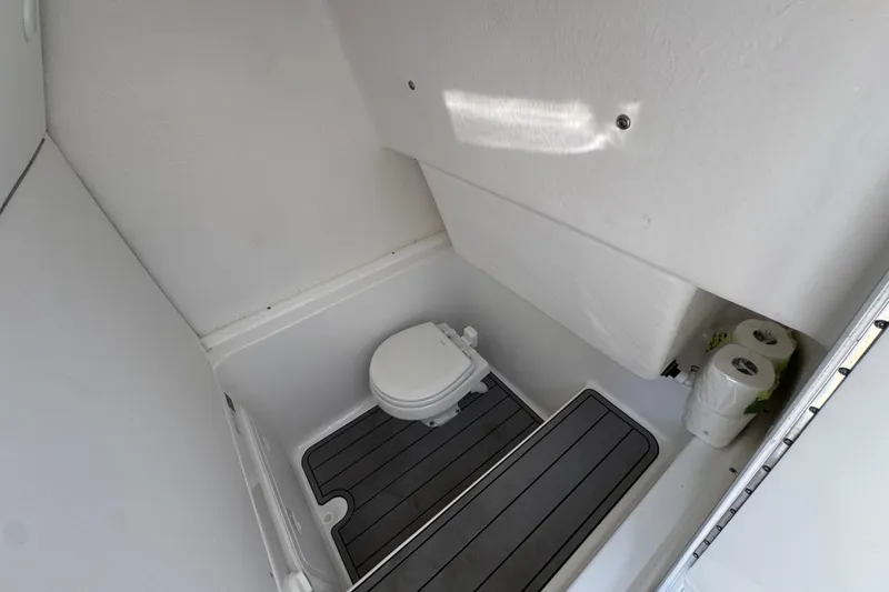 Slide: The Image of 2025 Cape Horn 32 XS boat interior bathroom with toilet and flooring. - 27