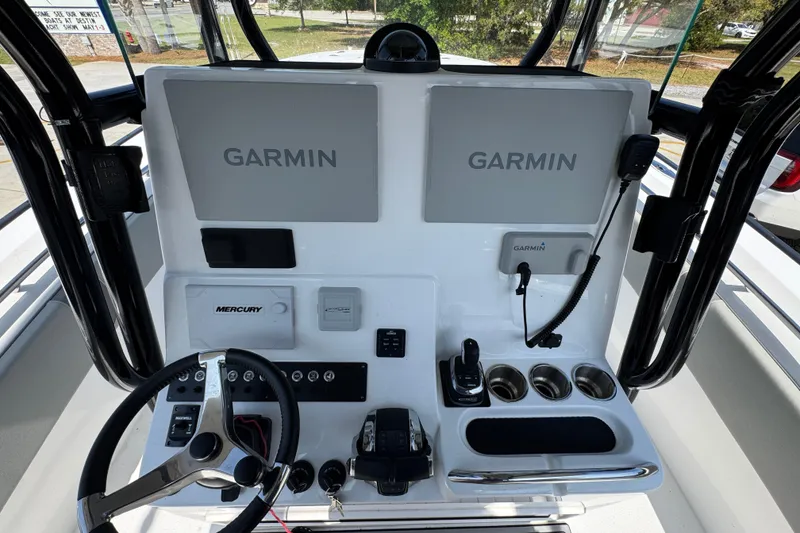 Slide: The Image of Cockpit of 2025 Cape Horn 32 XS boat with Garmin navigation displays. - 29