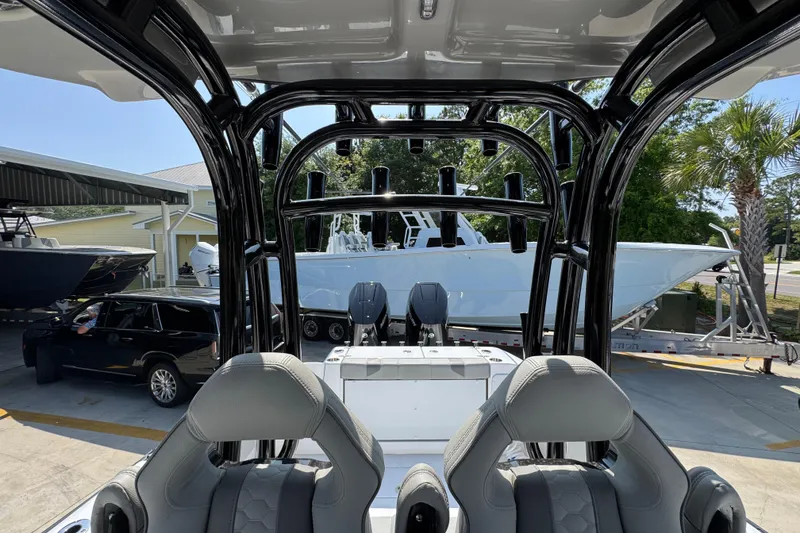 Slide: The Image of 2025 Cape Horn 32 XS boat interior with sleek seating and modern design features. - 34