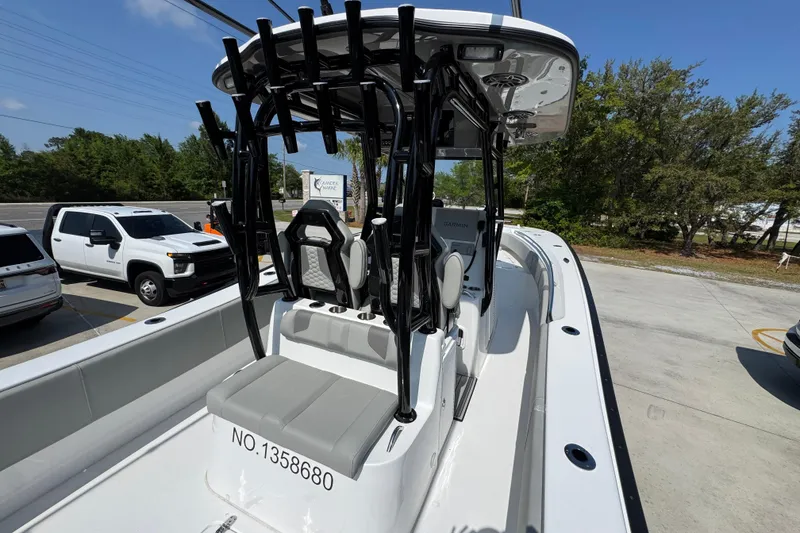 Slide: The Image of 2025 Cape Horn 32 XS boat with sleek design, parked outdoors on a sunny day. - 38