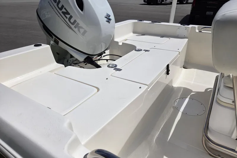 Slide: The Image of 2023 Bulls Bay 2000 boat with Suzuki outboard motor, featuring spacious deck layout. - 8