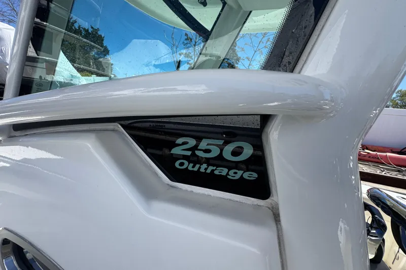 Slide: The Image of 2017 Boston Whaler 250 Outrage boat detail with model name visible. - 4